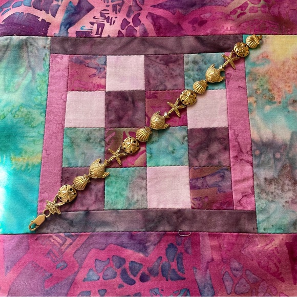 VINTAGE 14K YELLOW GOLD STARFISH, SHELL, AND SAND DOLLAR BRACELET 7” FINAL 🩷 - Picture 16 of 17